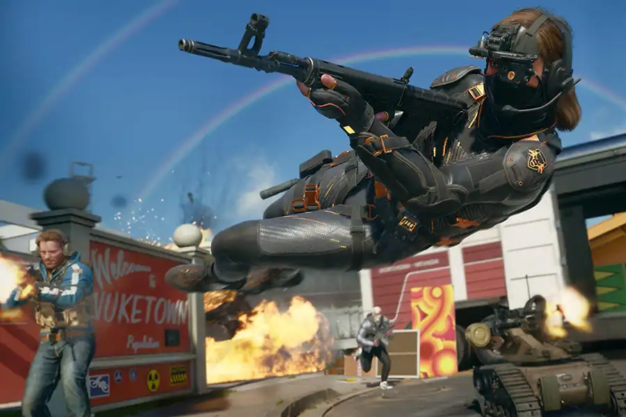 A character diving into the air while shooting in the multiplayer portion of the game.