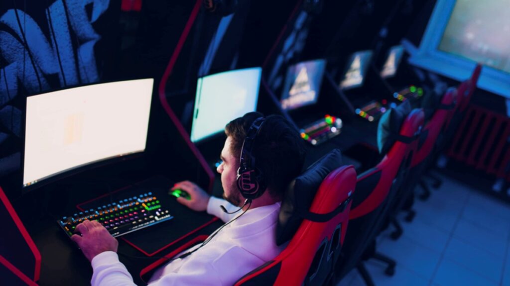 a picture of a group of players sitting behind gaming computers