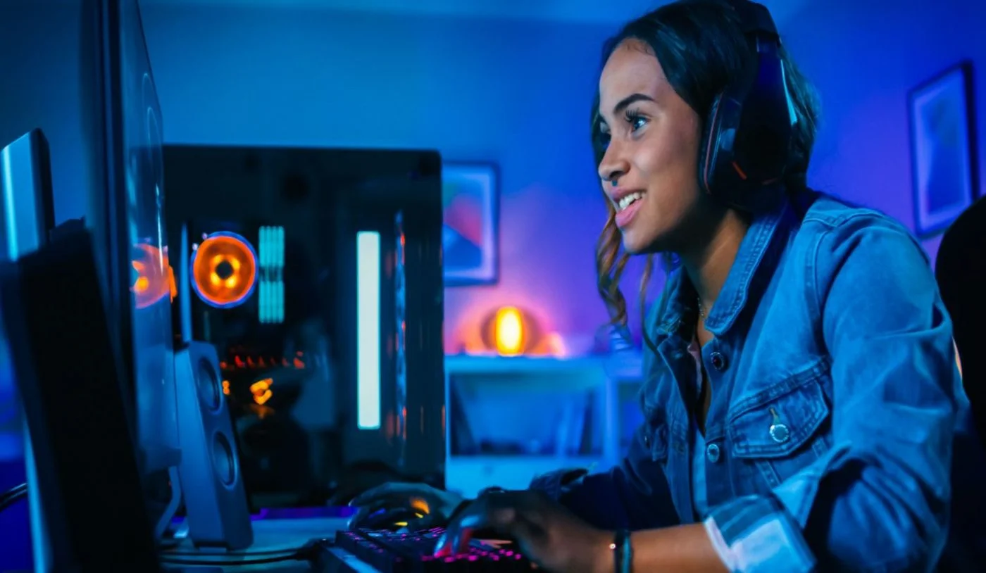 an image of a female player playing games.