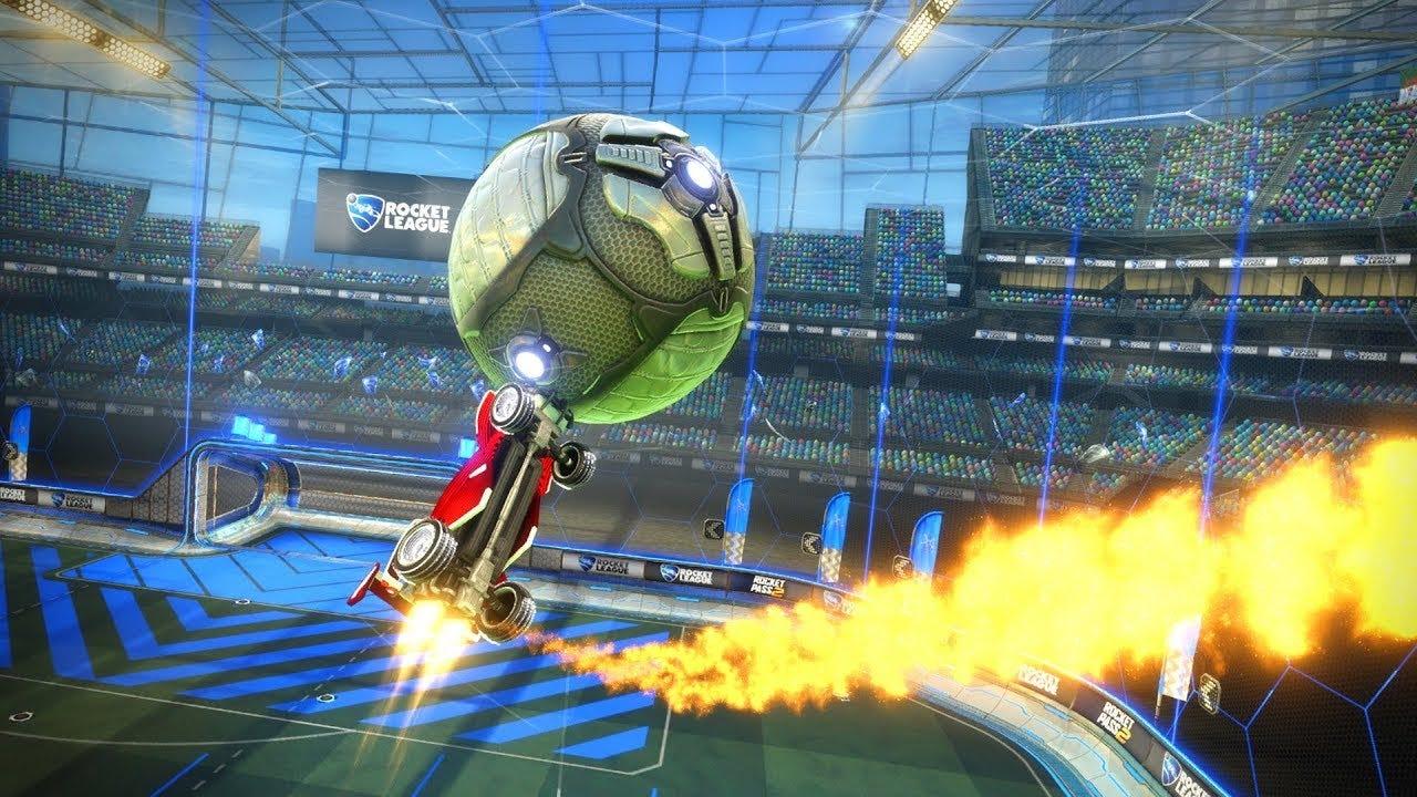 A red car hits the ball in the skies of Rocket League.