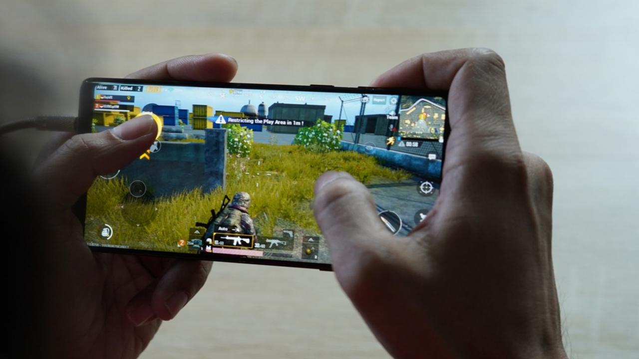 an image of a gamer playing PUBG Mobile.