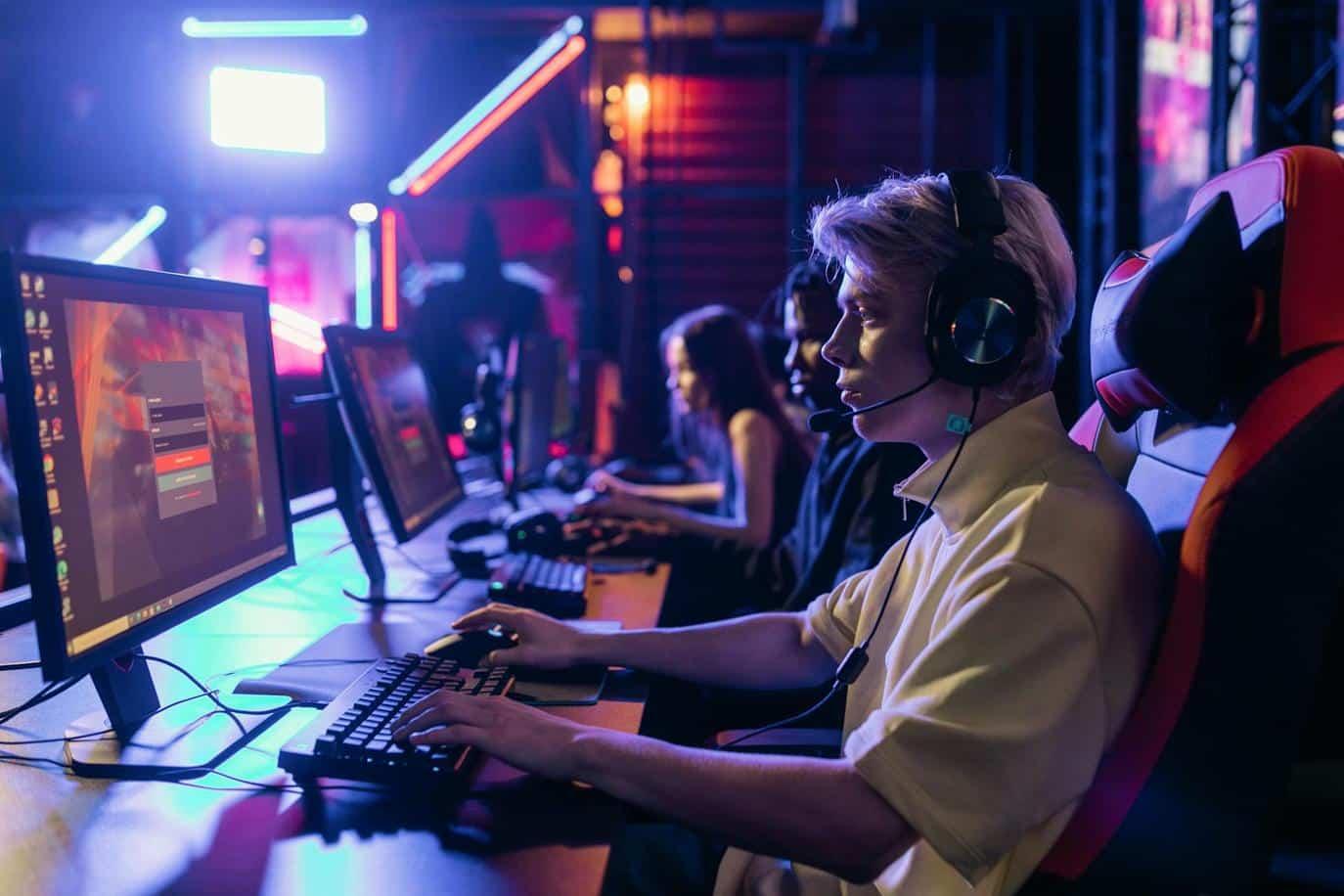 an image of a player working with his computer.