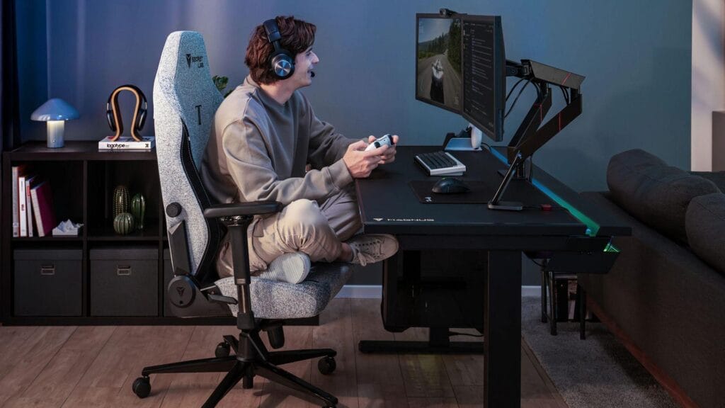 An image of a gamer sitting in his gaming chair