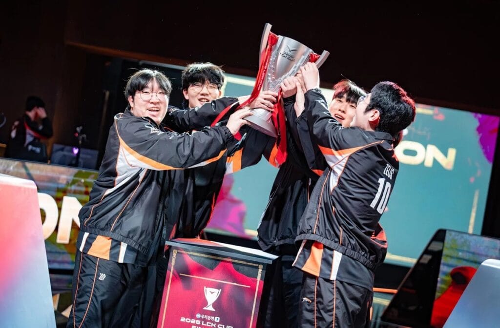 a picture of a Chinese Esports Team with a trophy