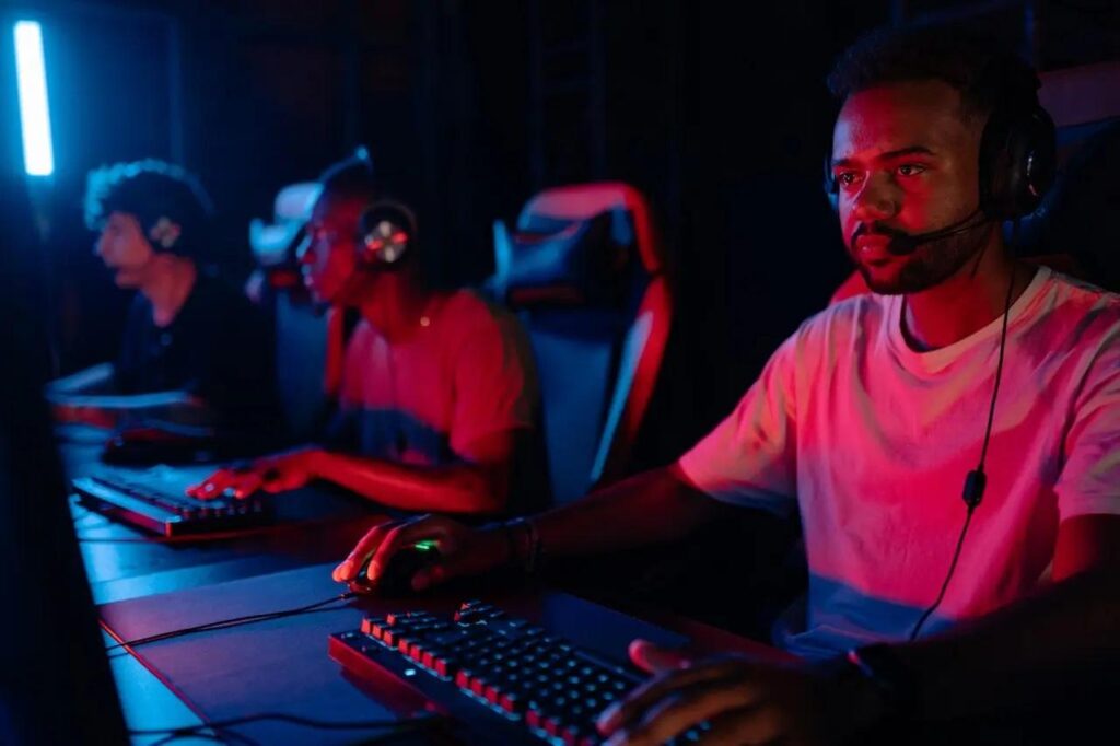 a picture of player behind their computers